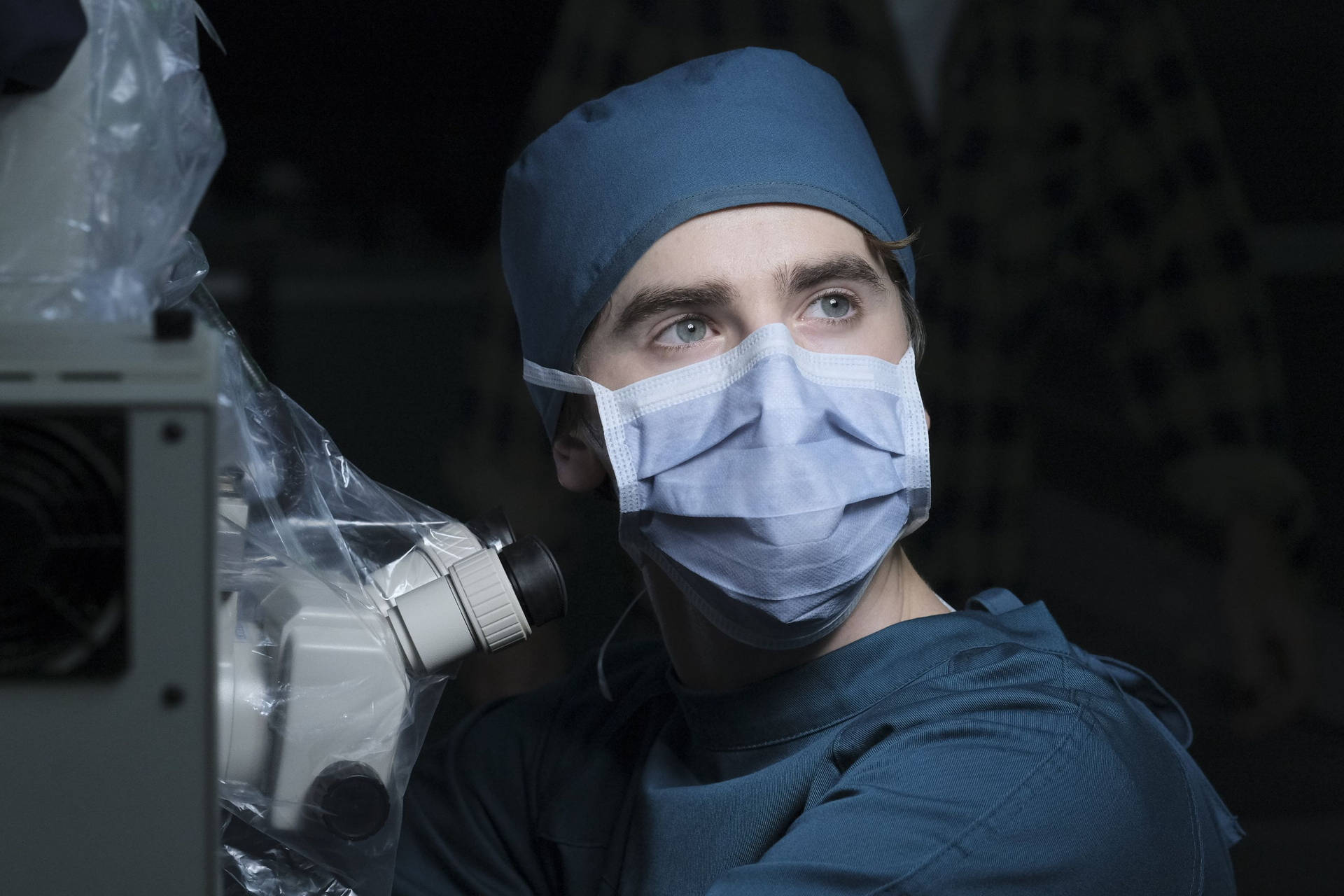 The Good Doctor Using Microscope Background