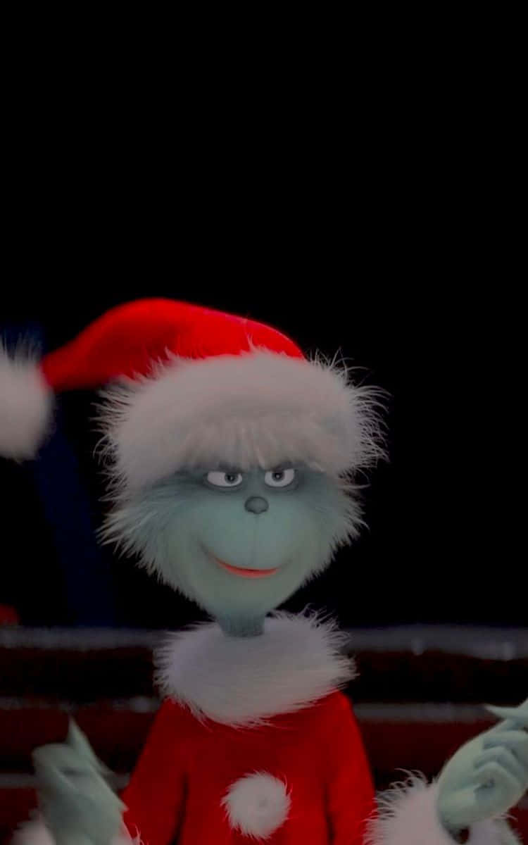 The Grinch In Santa Claus Costume Background