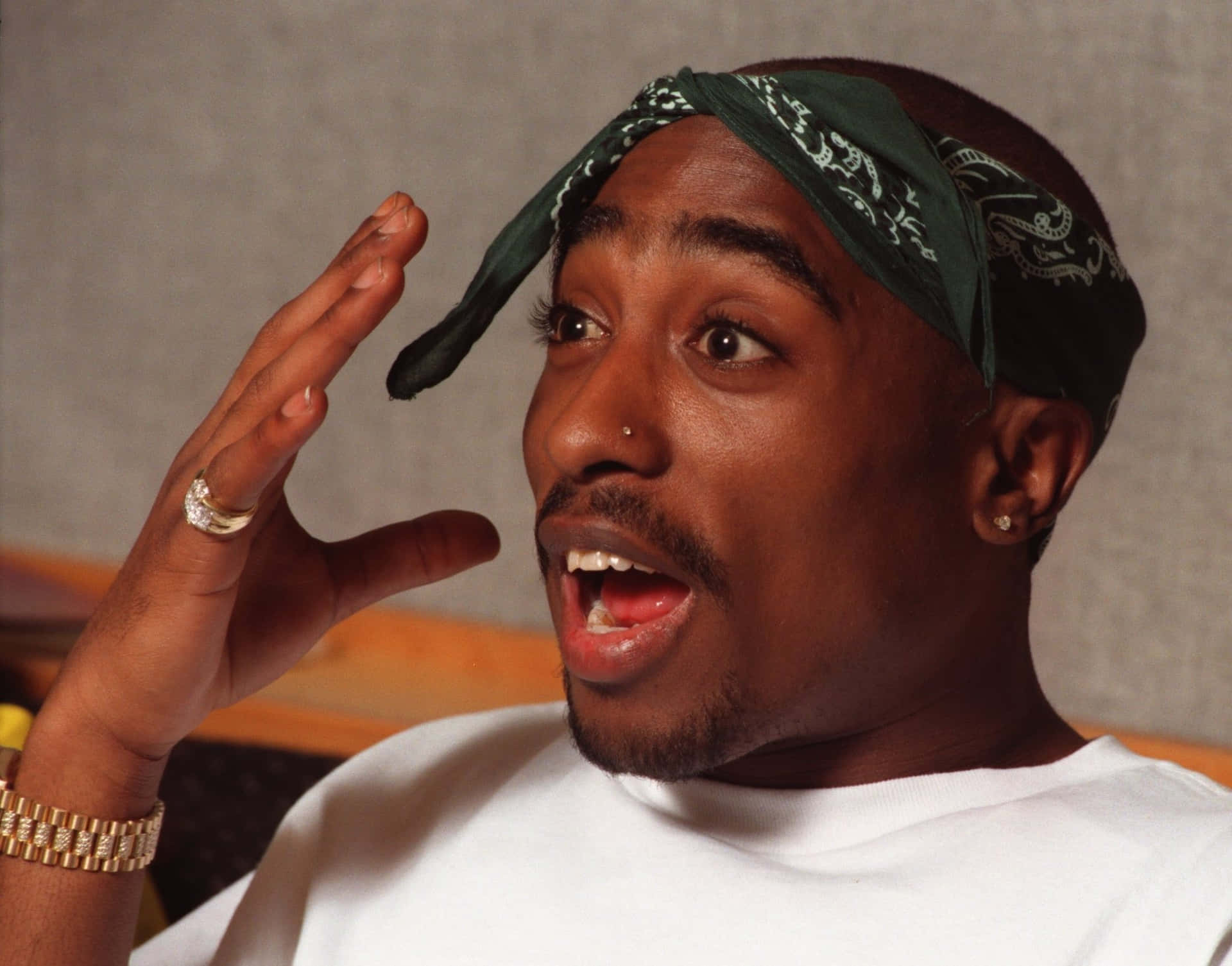 The Hip Hop Icons Tupac Shakur And Notorious B.i.g. In A Rare Moment Together Background