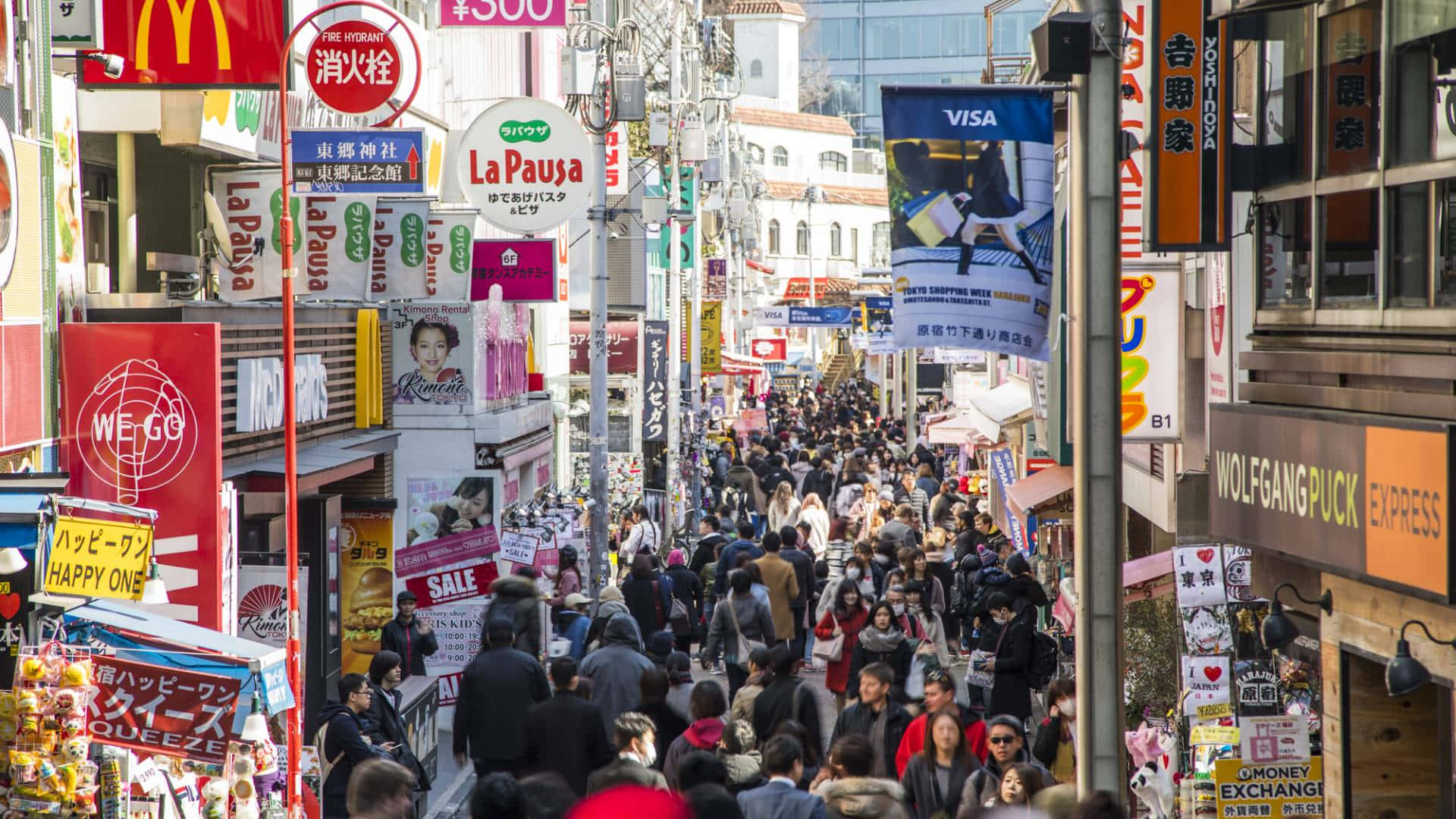 The Hustle And Bustle Of Harajuku Background