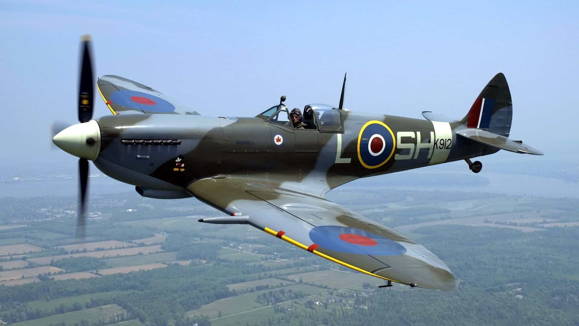 The Iconic British Spitfire Wwii Warbird Background