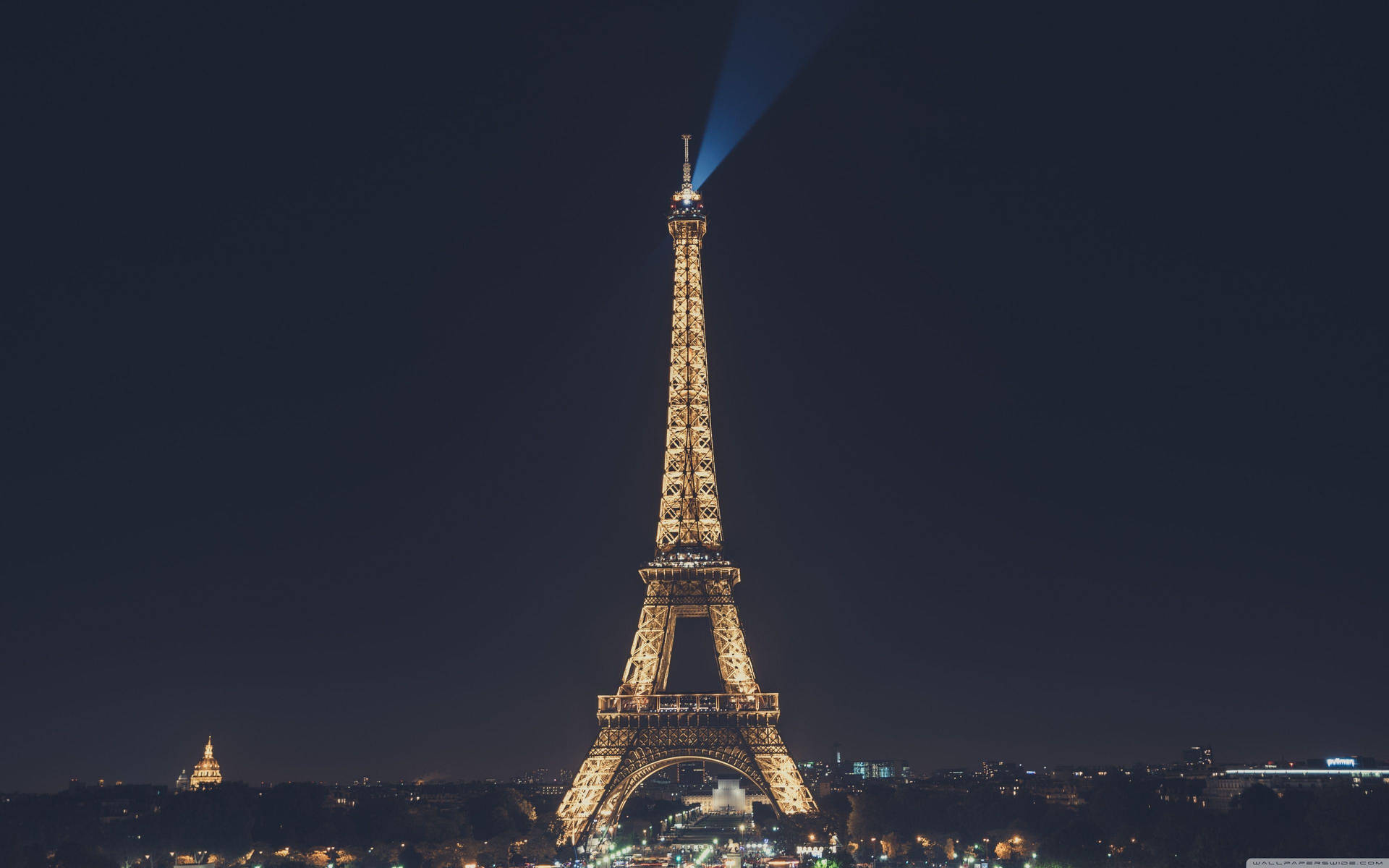 The Iconic Eiffel Tower, A Beloved Symbol Of Paris Background