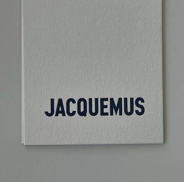 The Iconic Jacquemus Logo On White Paper Background