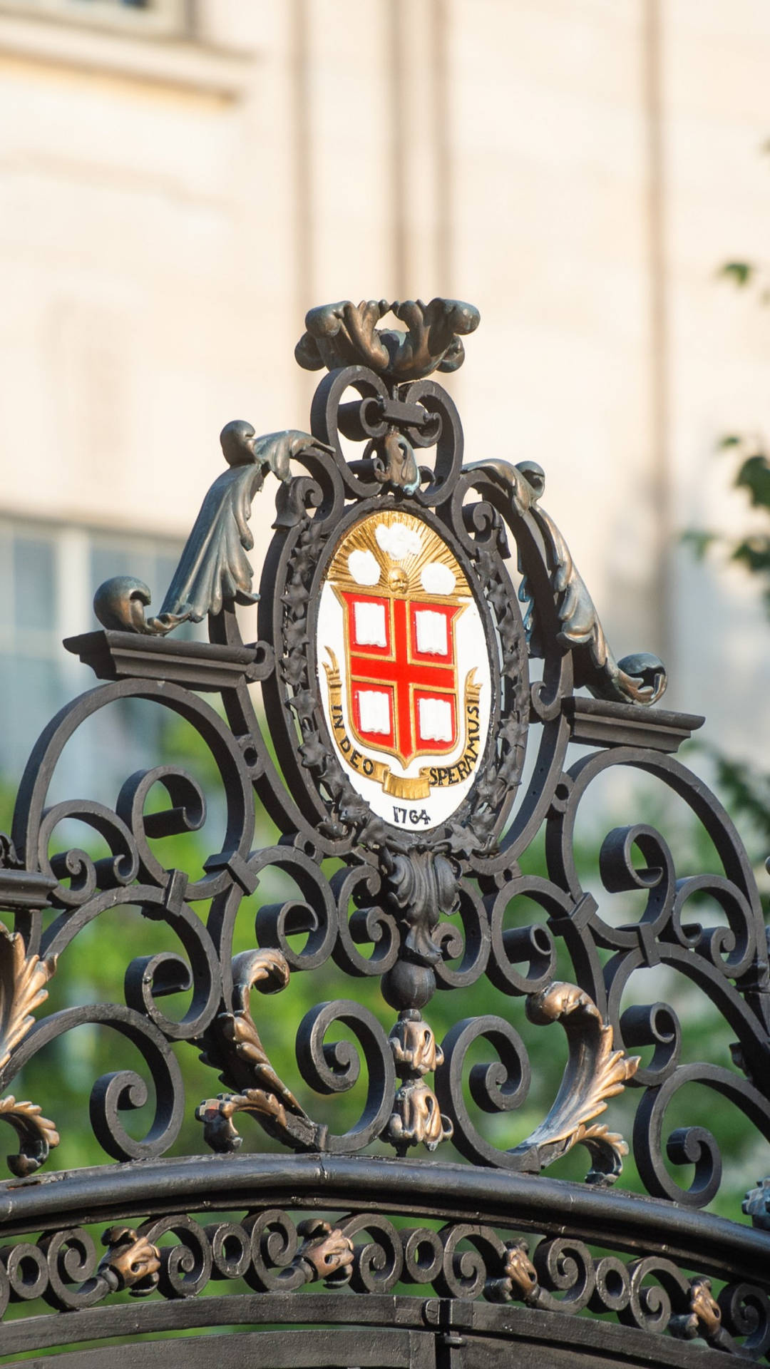 The Iconic Logo Of Brown University At The College Gate Background