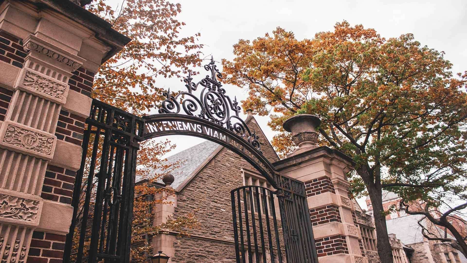 The Iconic Metal Arch At The University Of Pennsylvania. Background