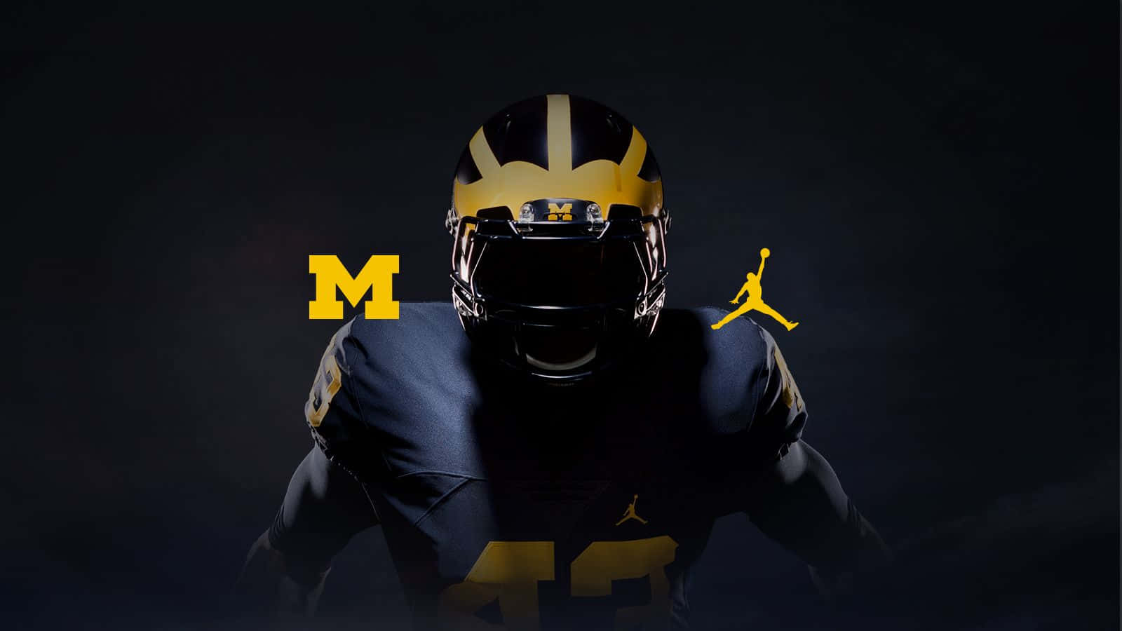 The Iconic Michigan Stadium Lit Up For A Wolverines Football Game. Background