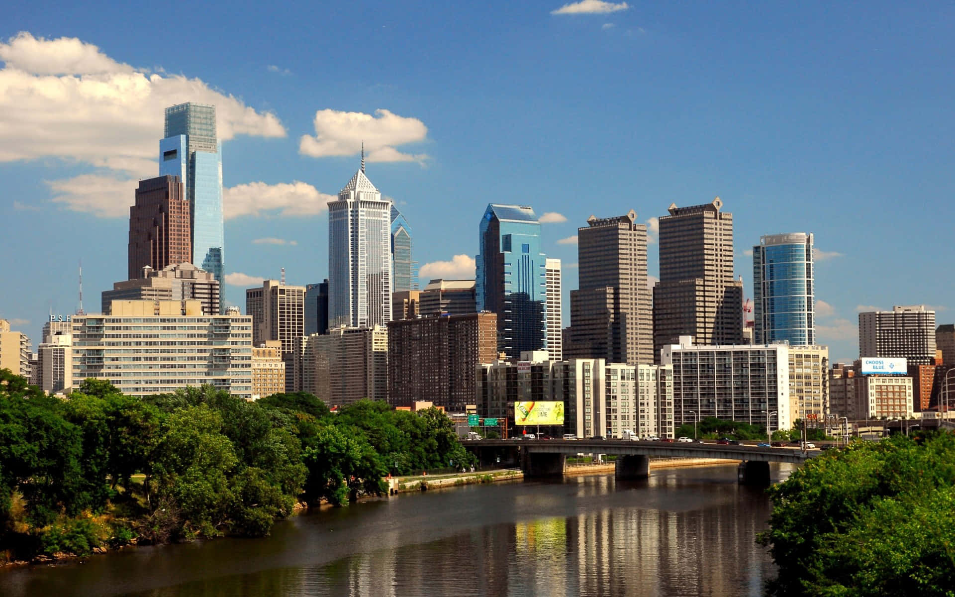 The Iconic Philadelphia Skyline During Sunset Background