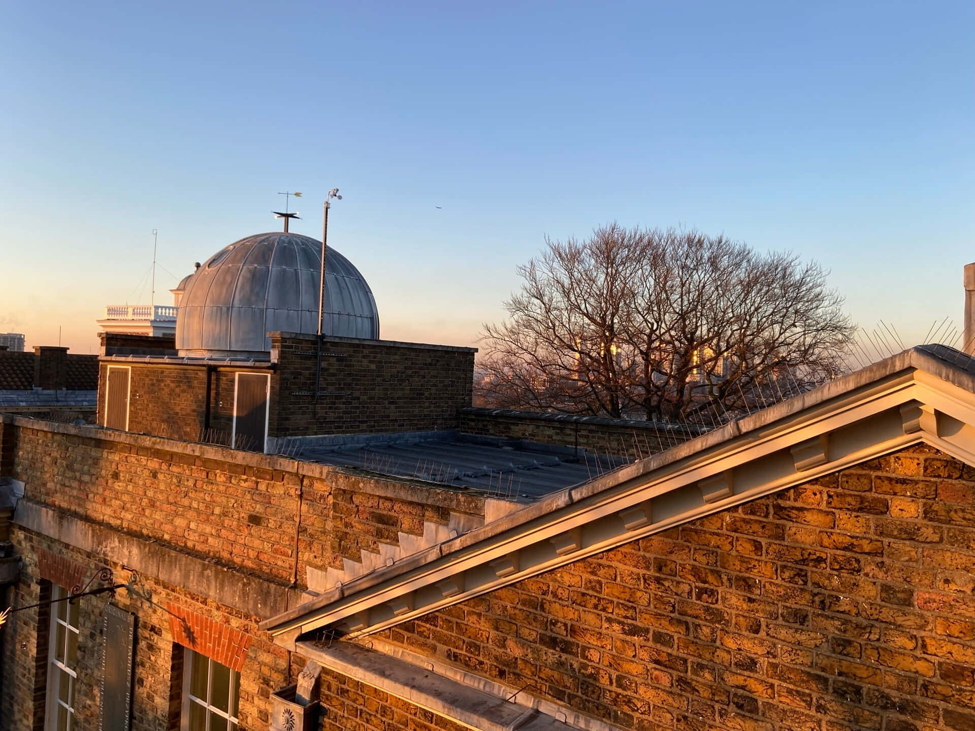 The Iconic Royal Observatory Under A Star-filled Sky In Greenwich, London. Background