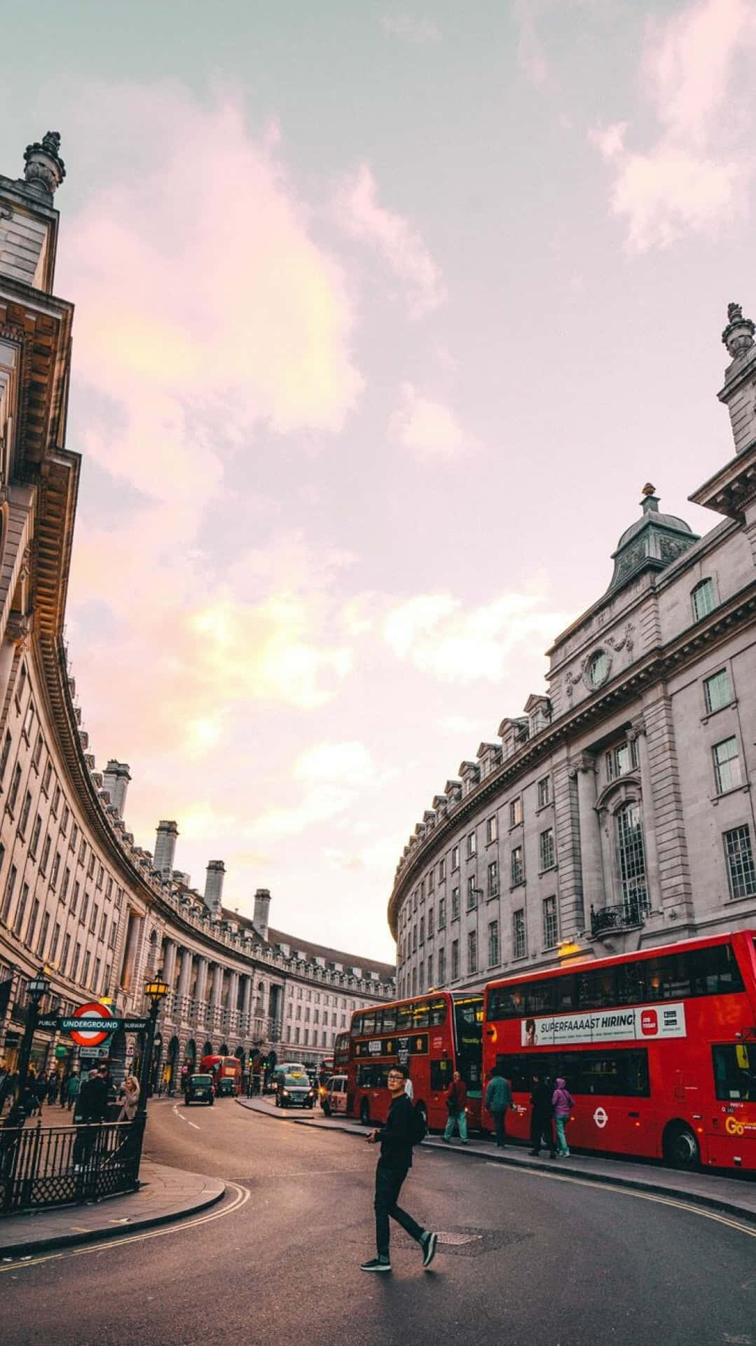 The Iconic Skyline Of London Showcased On An Iphone Device Background