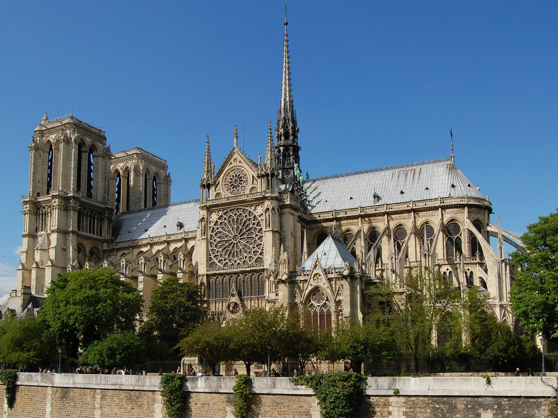 The Iconic South Rose Window Of Notre Dame Cathedral Background