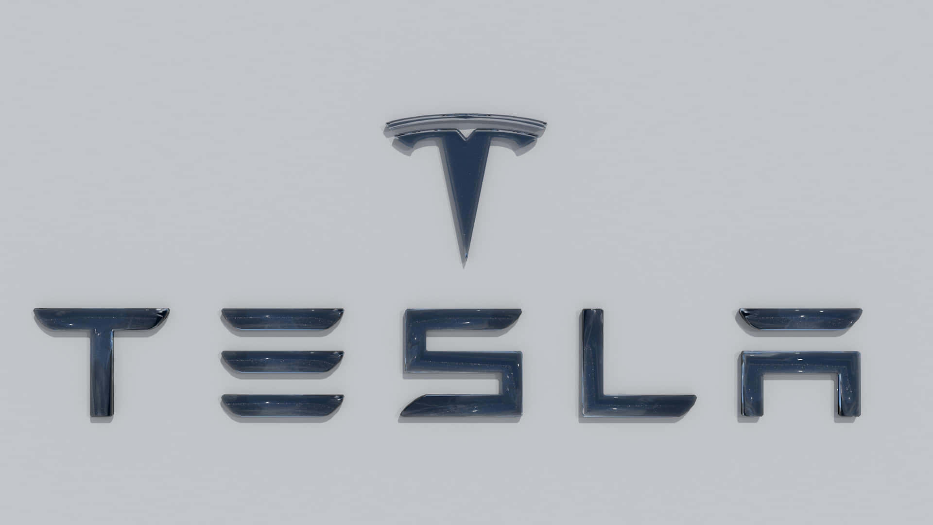 The Iconic Tesla Logo In 4k Background