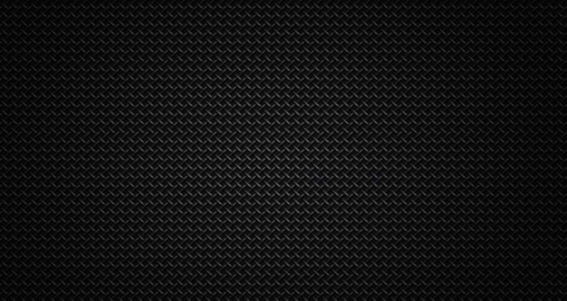 The Impossible Gloss Of Black Carbon Fiber Background