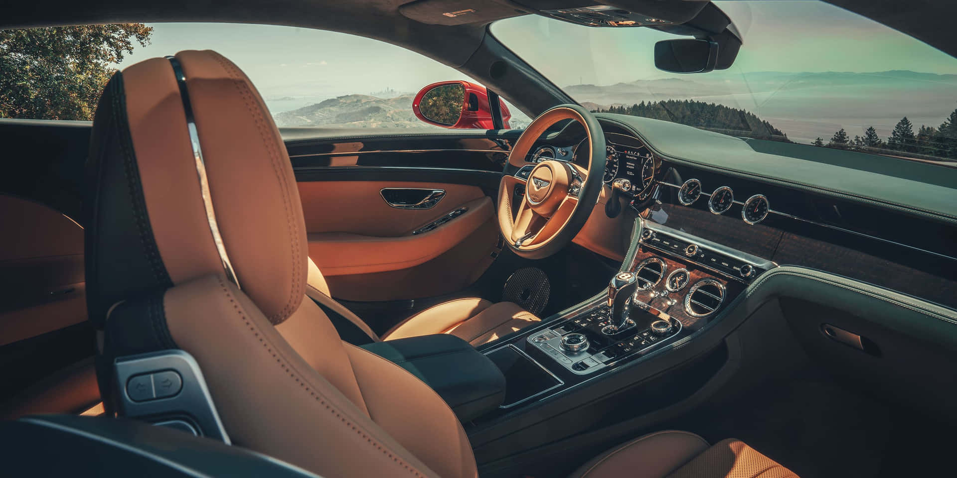 The Interior Of A Bentley Continental Gt Background