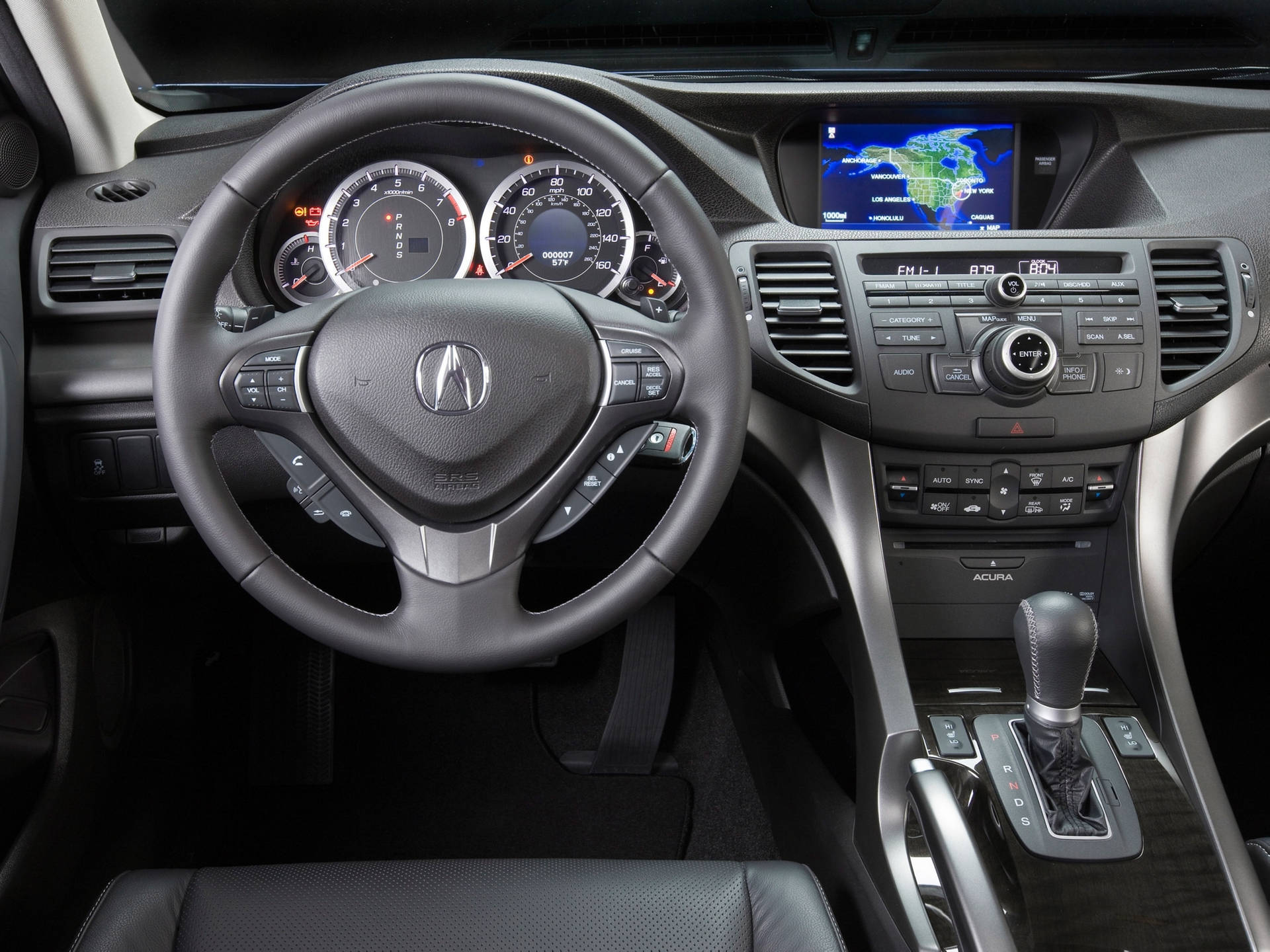The Interior Of A Car With A Dashboard And Steering Wheel Background