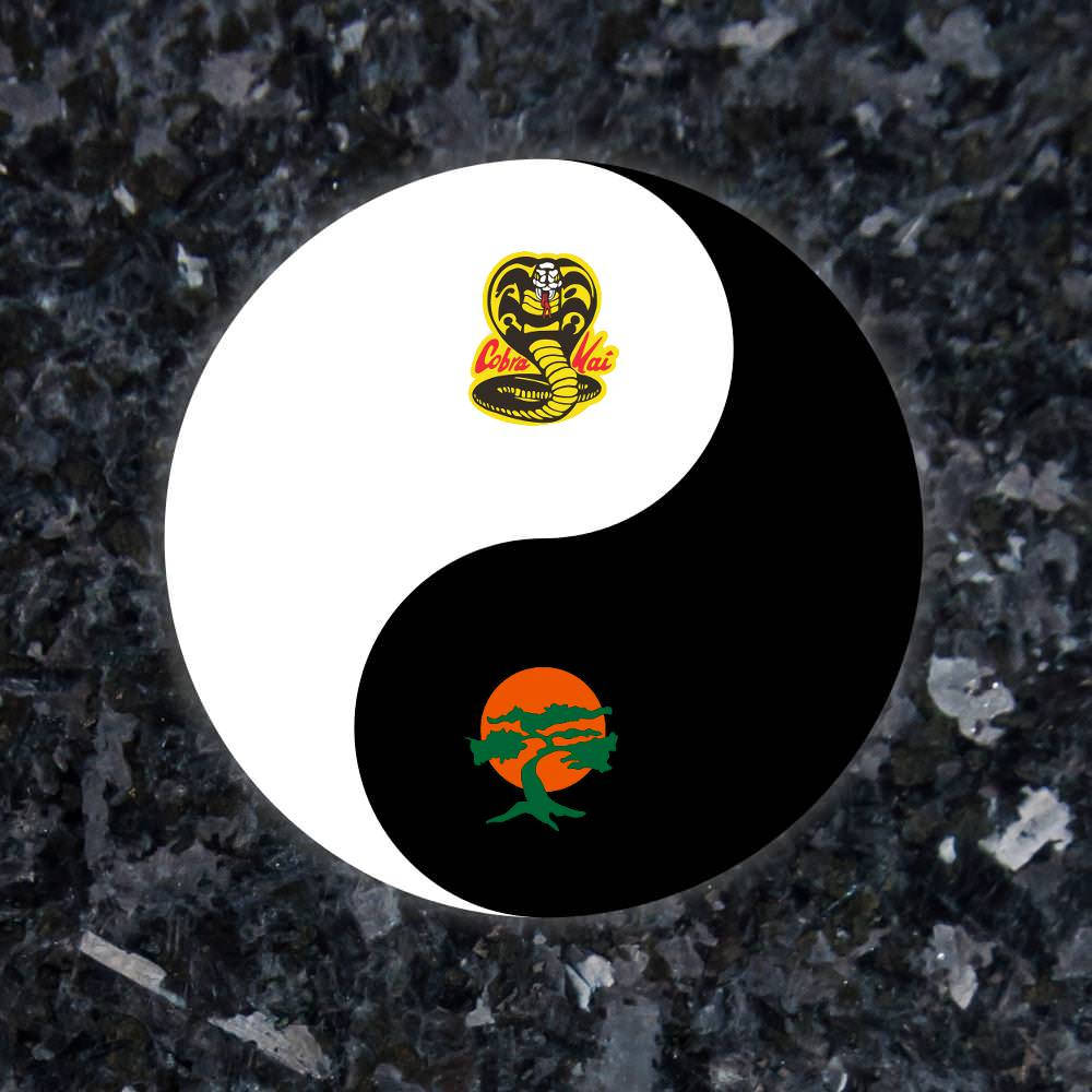 The Intricate Yin And Yang Symbol, Representing The Opposing Forces Of Cobra Kai And Miyagi-do