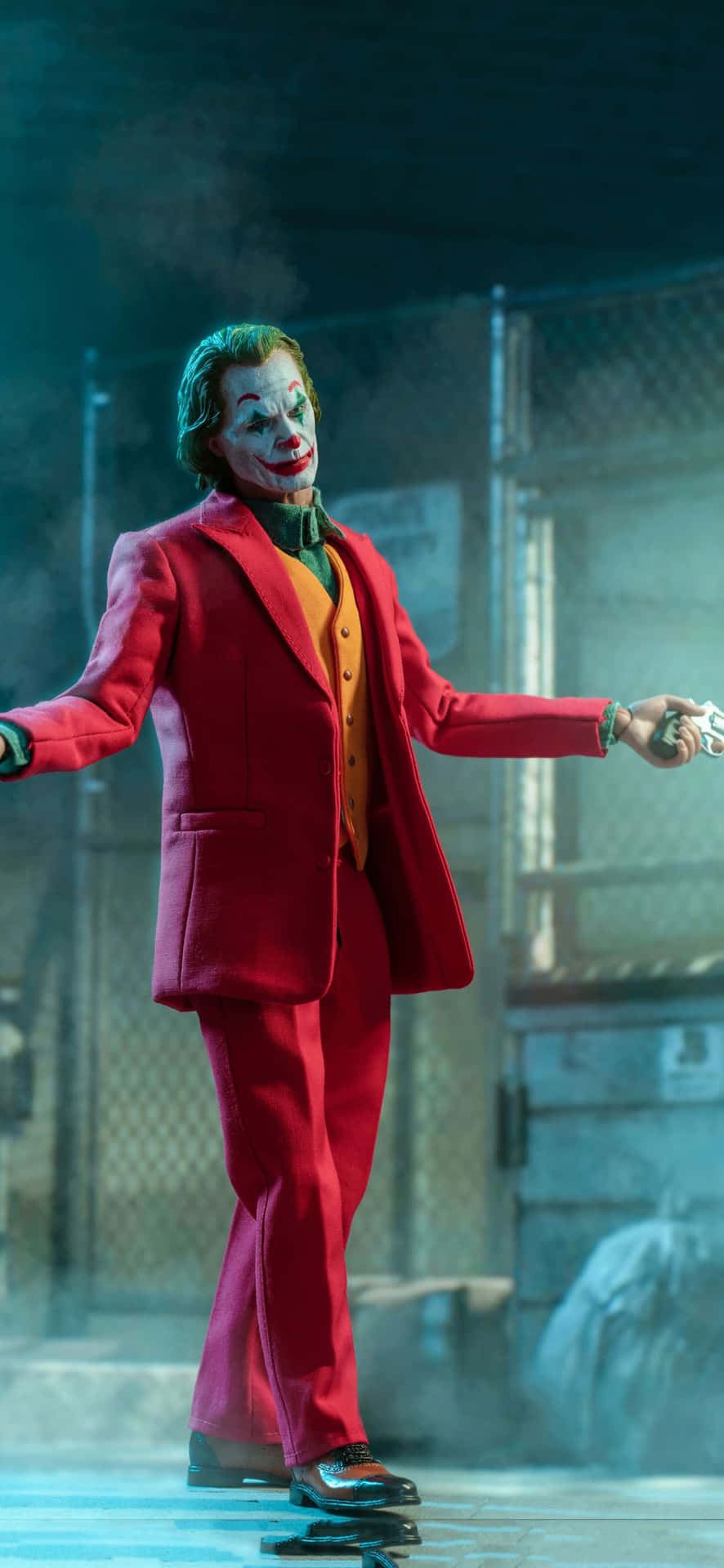 The Joker Is Holding A Gun And Is Holding A Gun Background