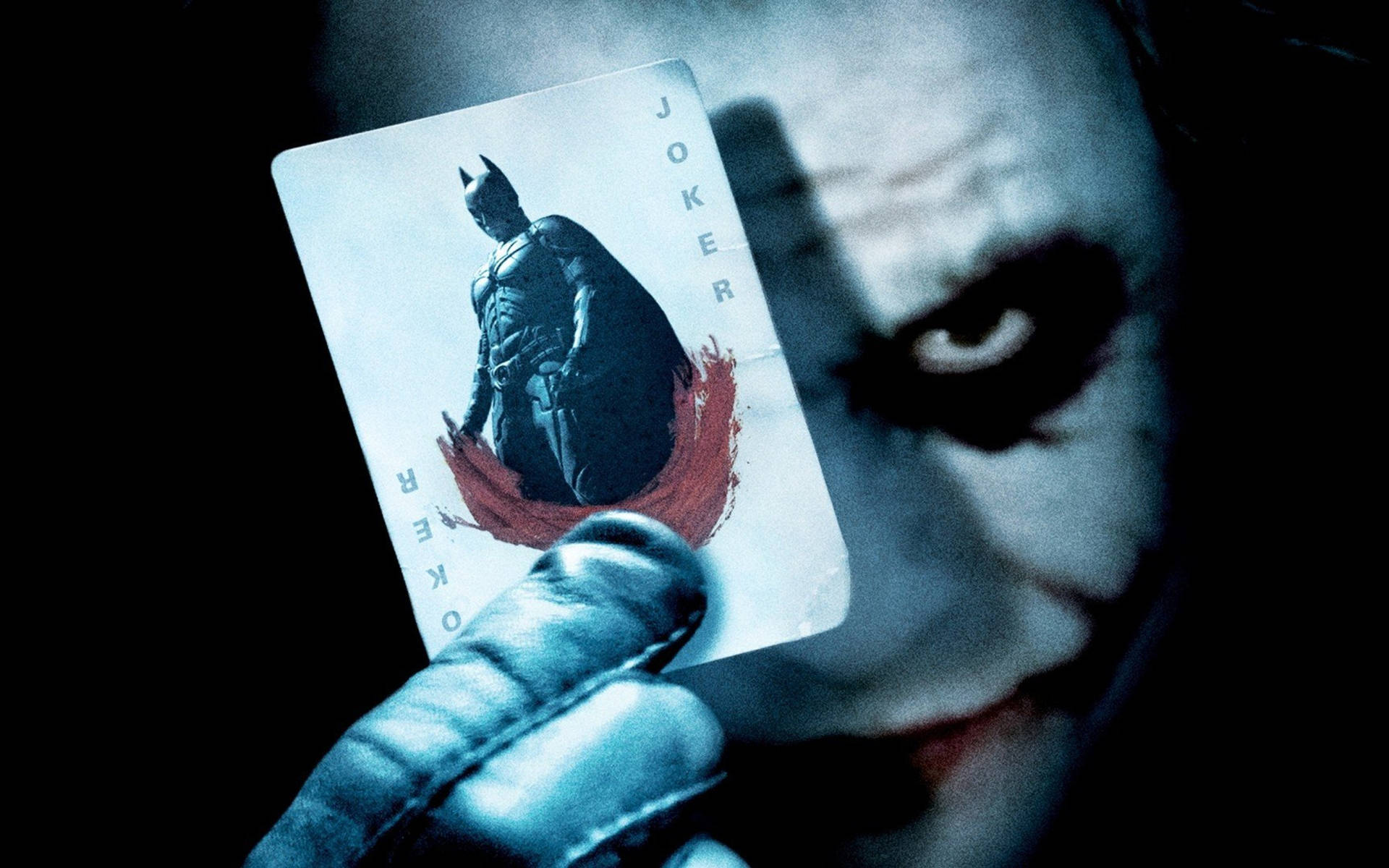 The Joker's Card In The Dark Knight Background