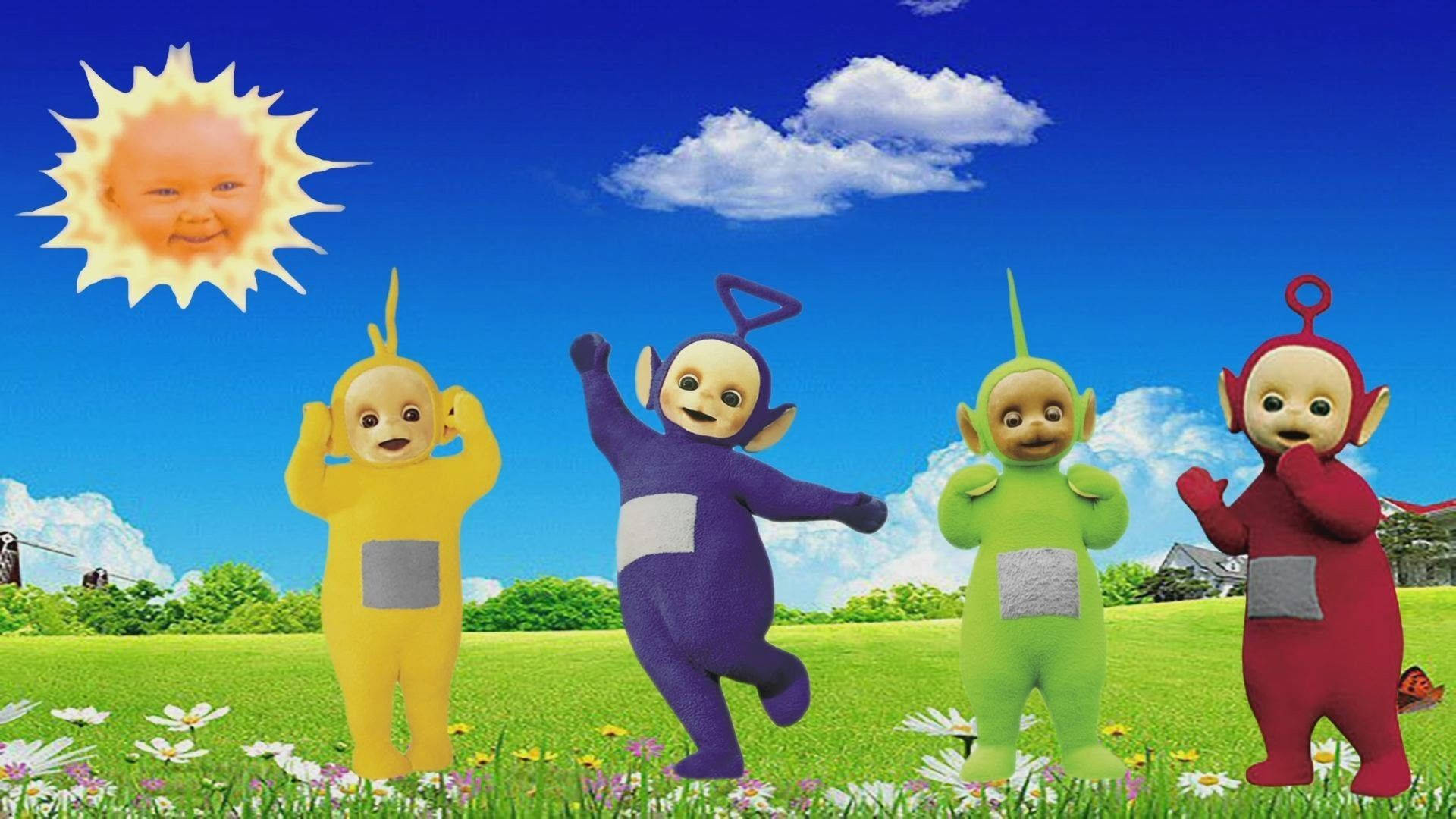 The Jovial Teletubbies Having Fun In Teletubbyland Background