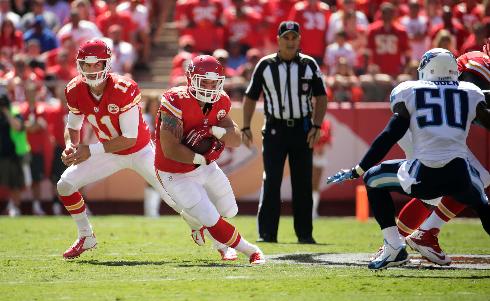 The Kansas City Chiefs Showcase Their 4k Visuals Against The Vegas Raiders Background