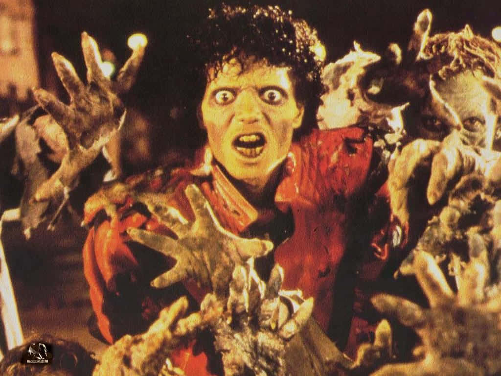The King Of Pop, Michael Jackson, Wowing The Crowd With His Iconic Performance Of 'thriller'. Background