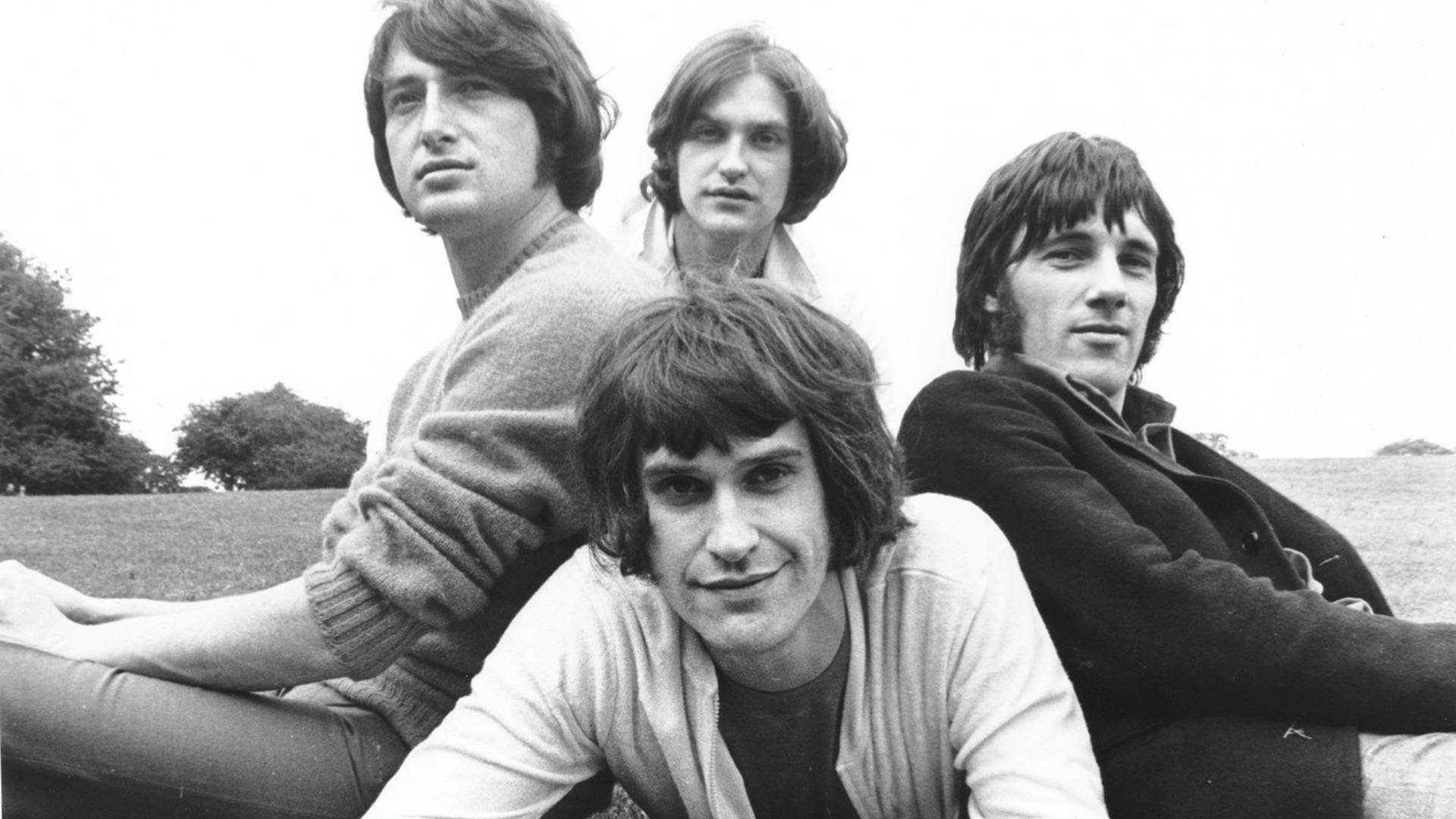 The Kinks Band Posing Together Background