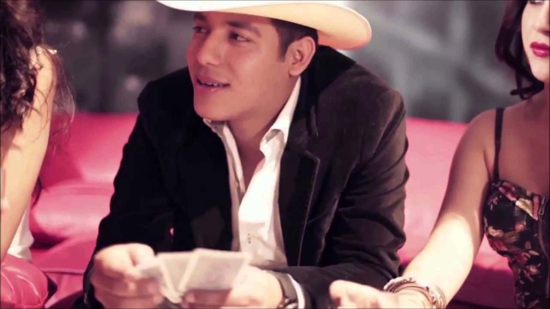 The Late Ariel Camacho In His Signature Guitar Pose Background