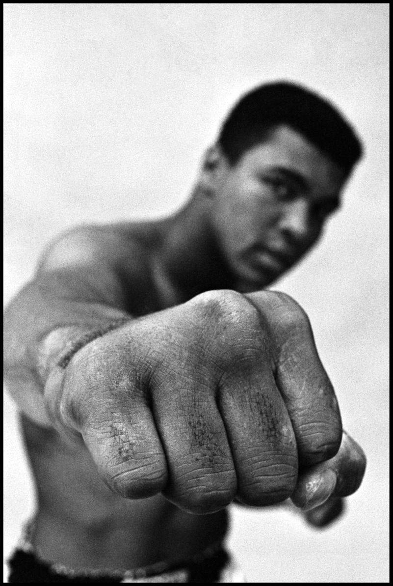 The Legend, Muhammad Ali, Flexing His Muscles Background