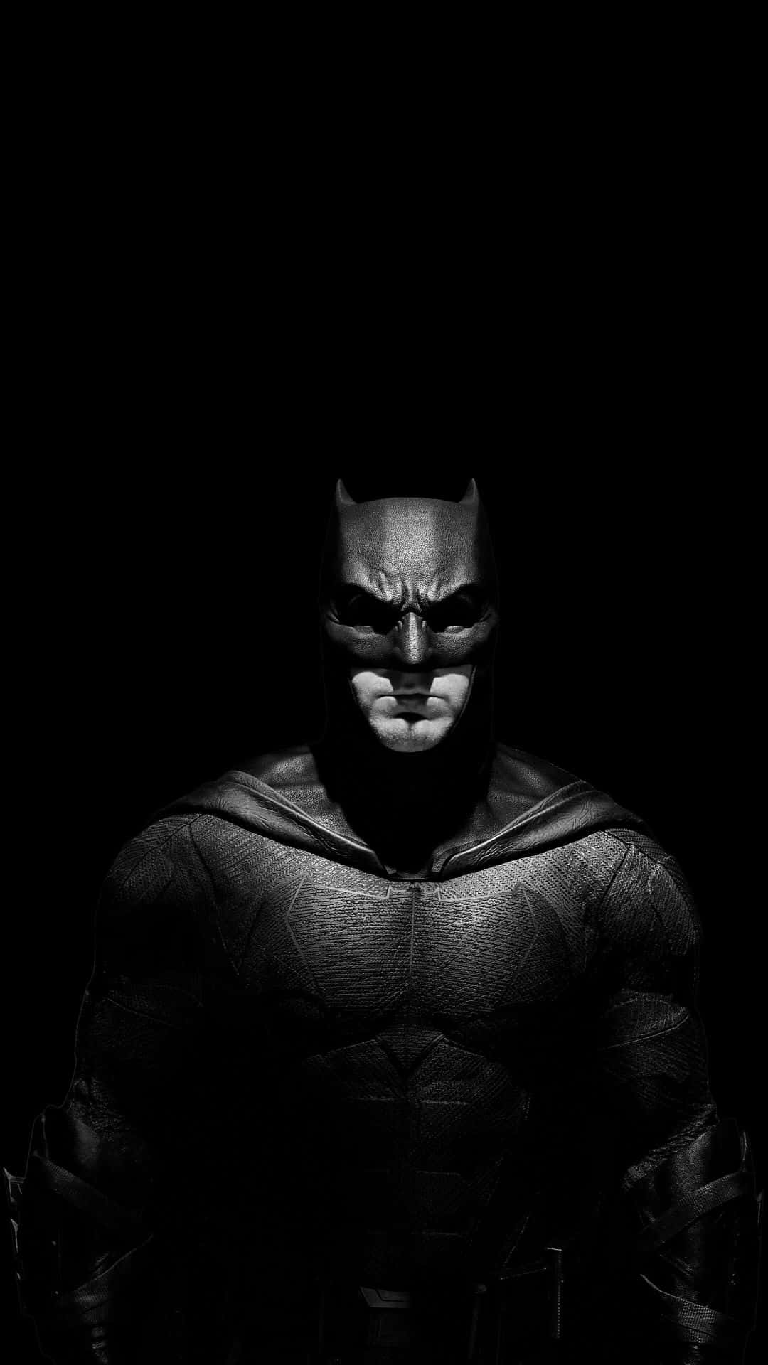 The Legendary Batman In The Spotlight Background