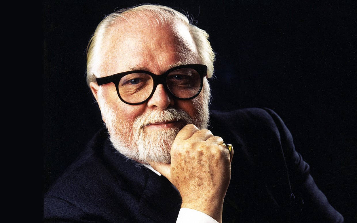 The Legendary Richard Attenborough Against A Black Backdrop