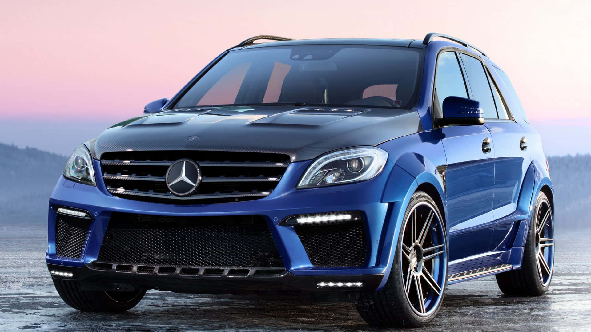 The Luxury Of Driving A Mercedes Benz Car Background