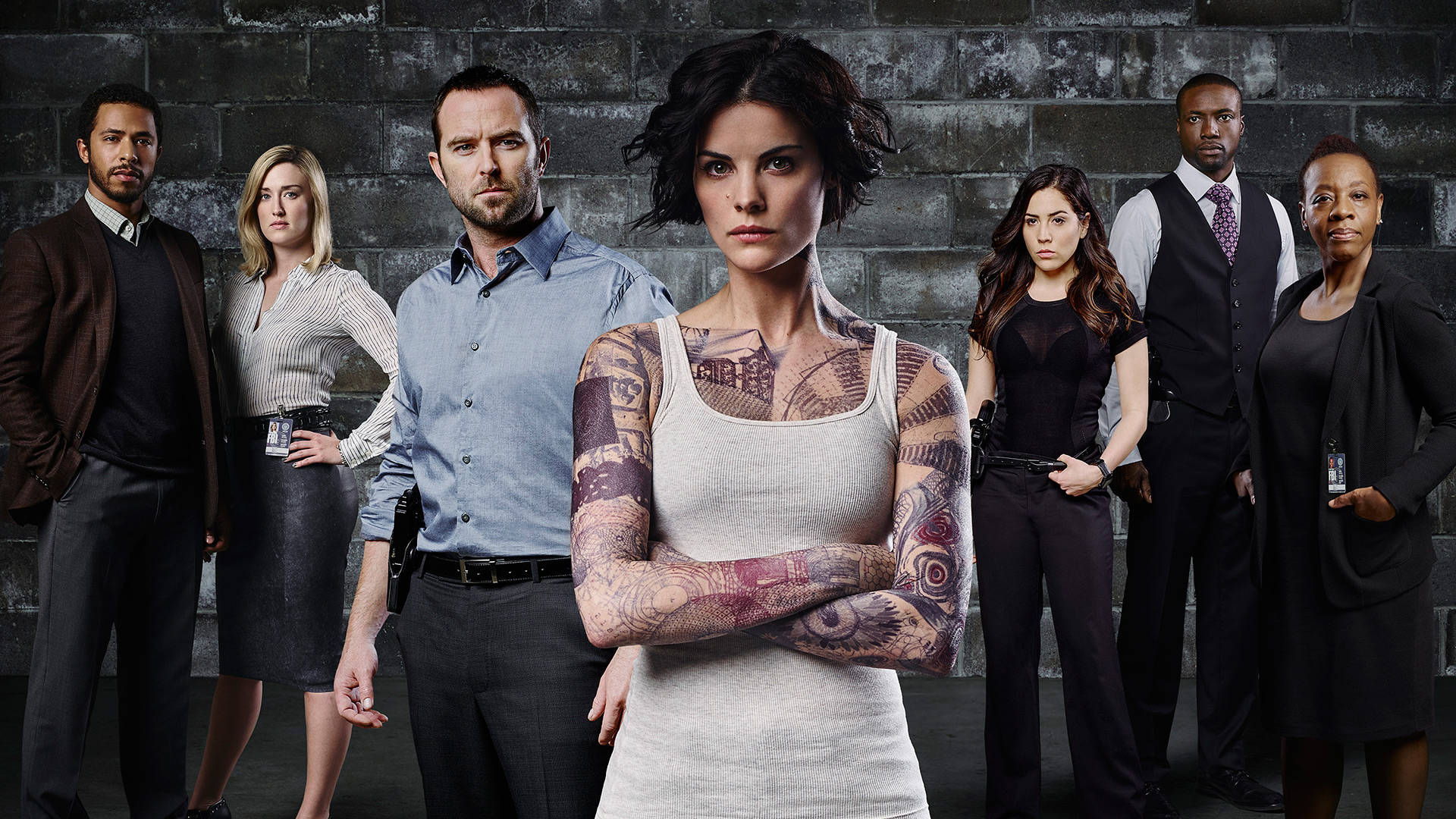 The Main Cast Of The Hit Series Blindspot Seen In A Dramatic Pose.