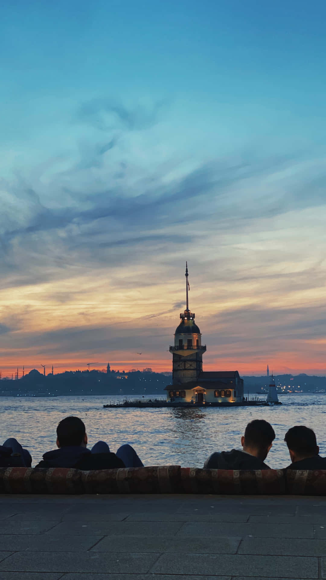 The Majestic Maiden Tower Against An Azure Sky Background