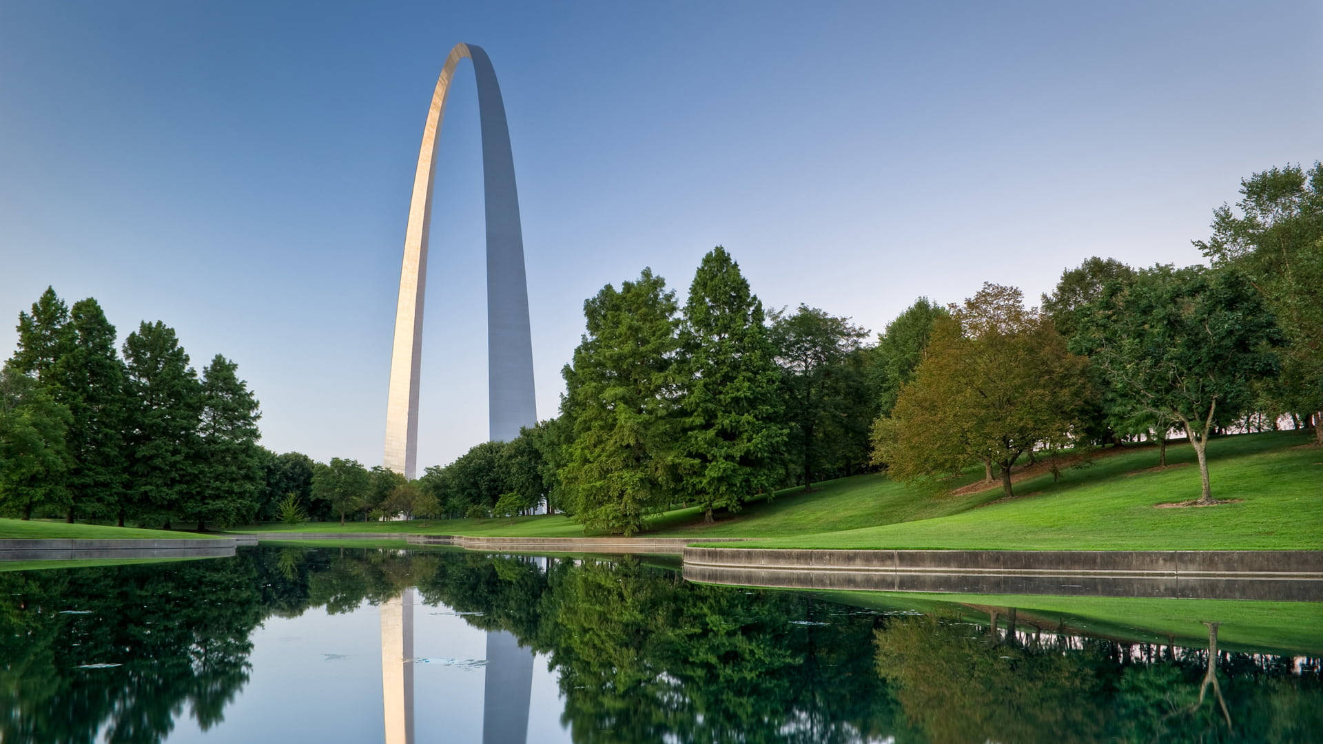 The Majestic St. Louis Arch Amidst Nature Background