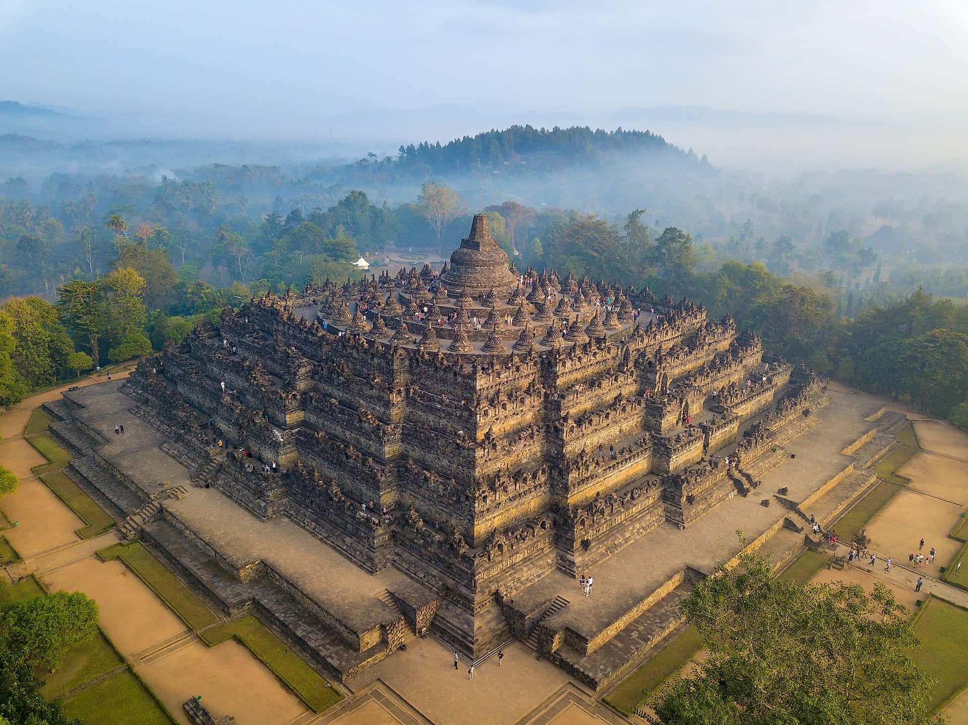 The Majestic Sunrise Over Borobudur Temple In Indonesia Background