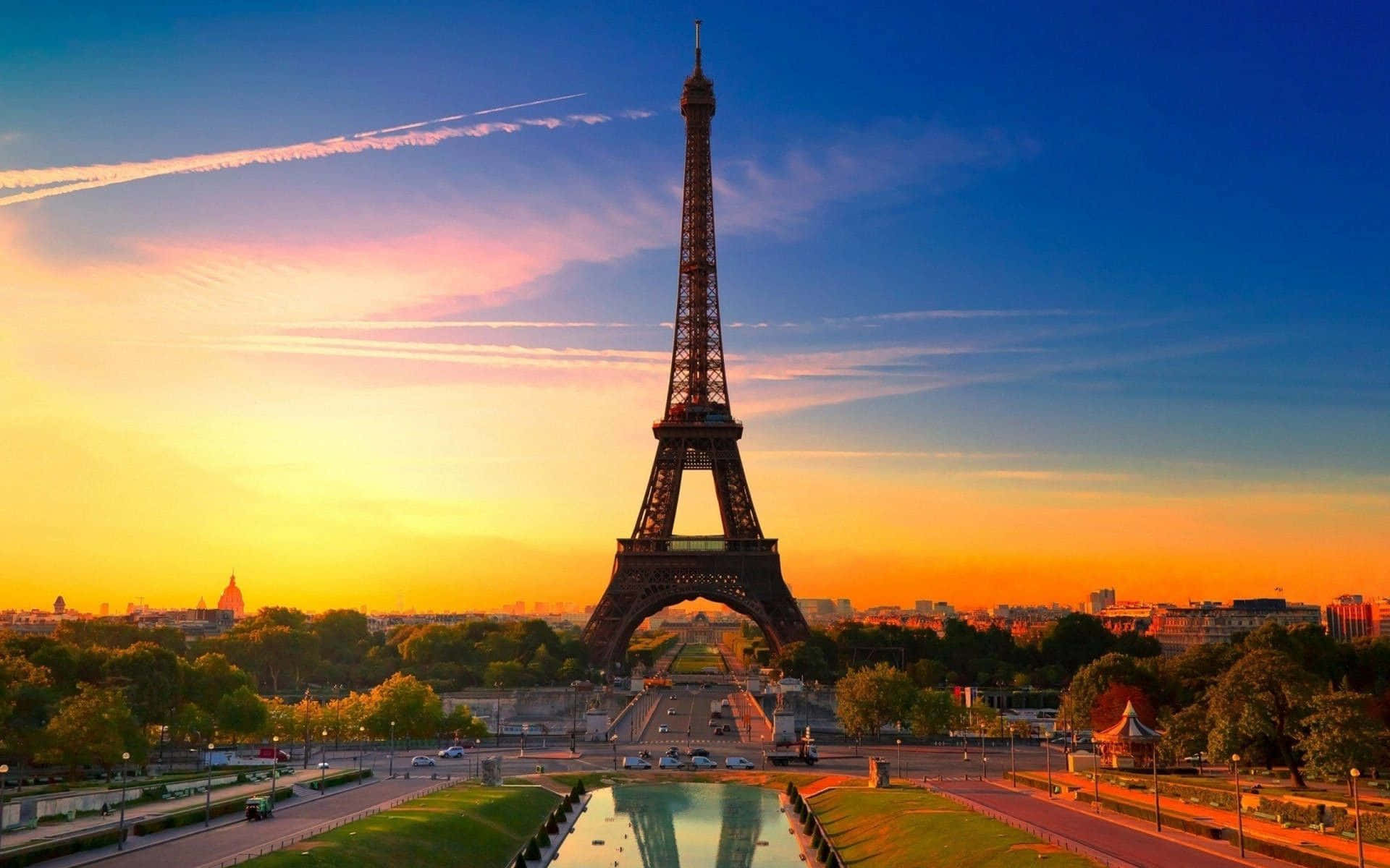 The Majestic View Of The Eiffel Tower At Dusk Background