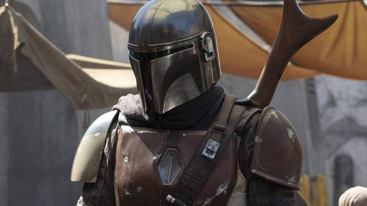 The Mandalorian Is Standing With His Saber