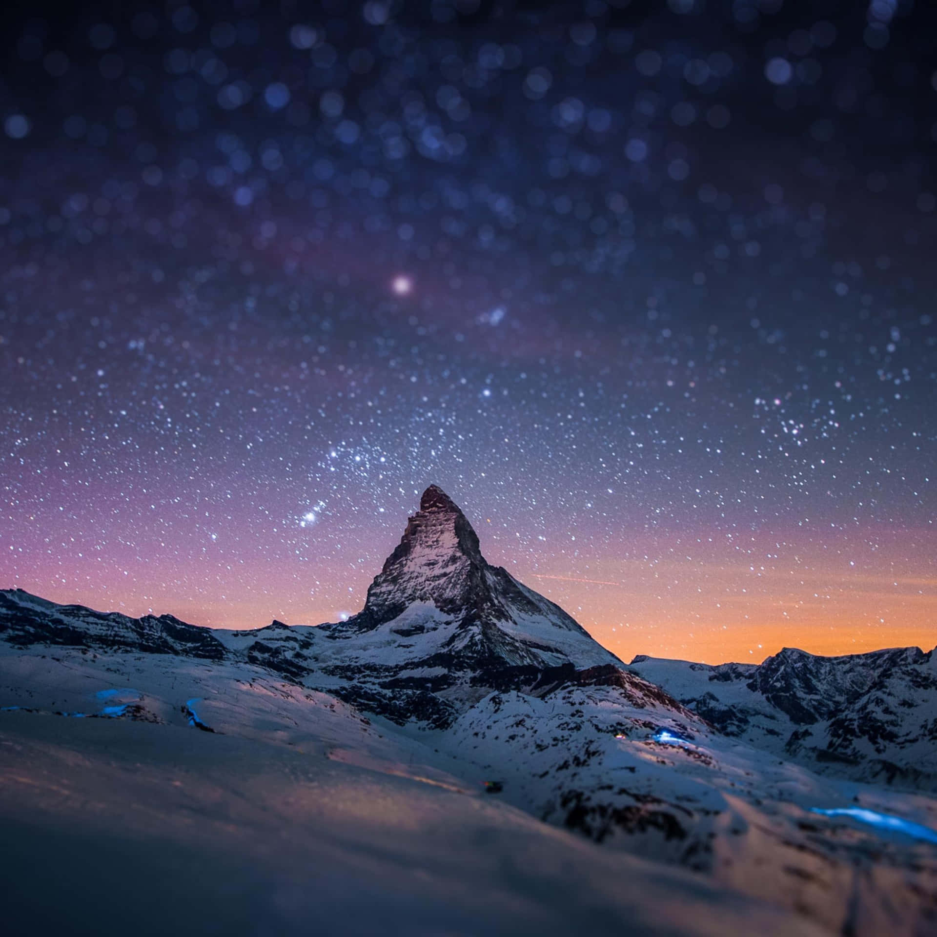 The Matterhorn At Night With Stars Above It Background