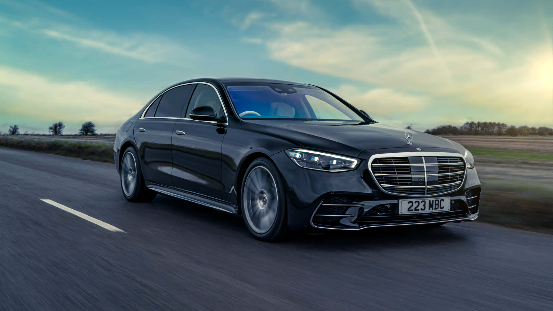 The Mercedes S Class Is Driving Down The Road