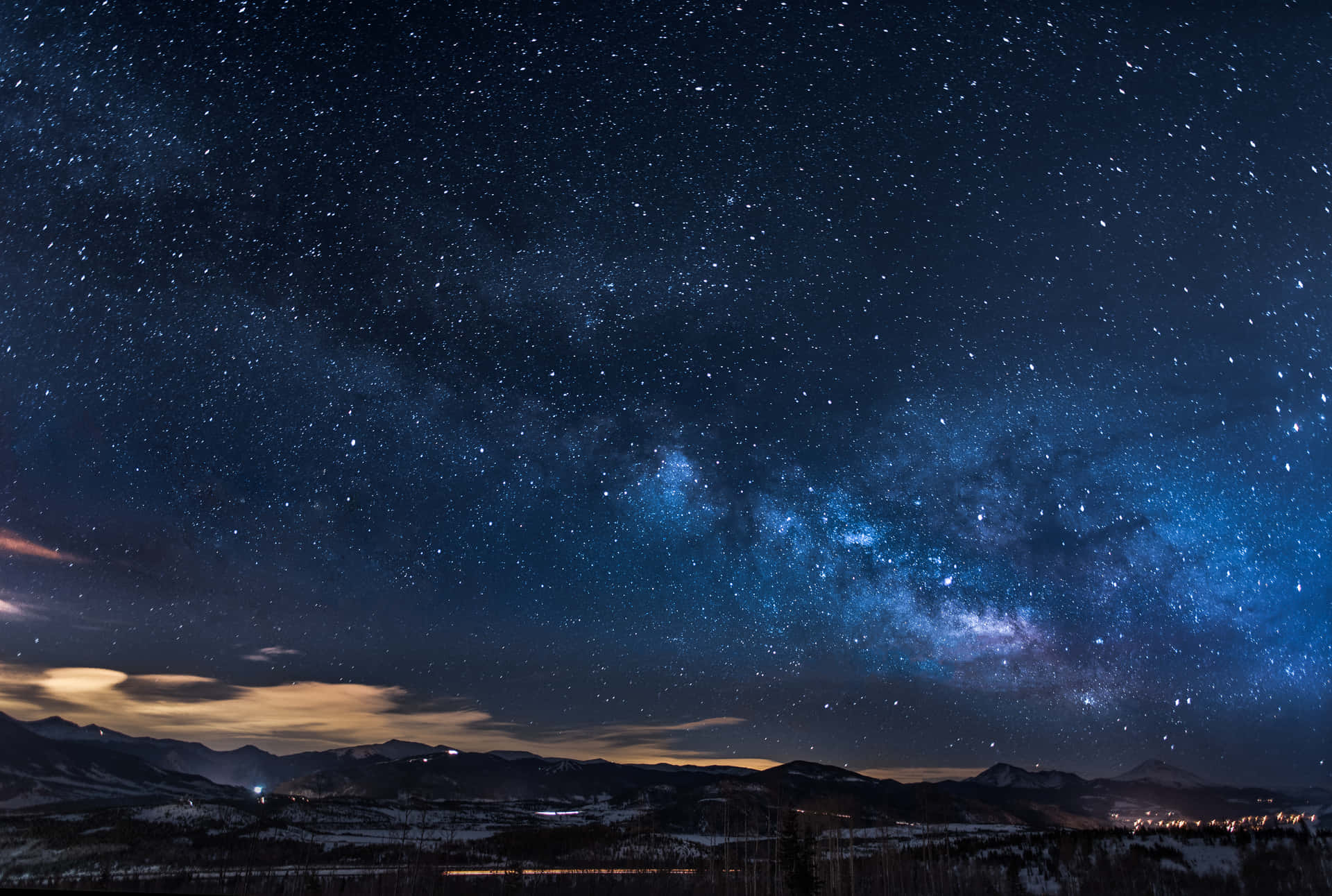 The Milky Is Seen Above A Mountain And Valley Background