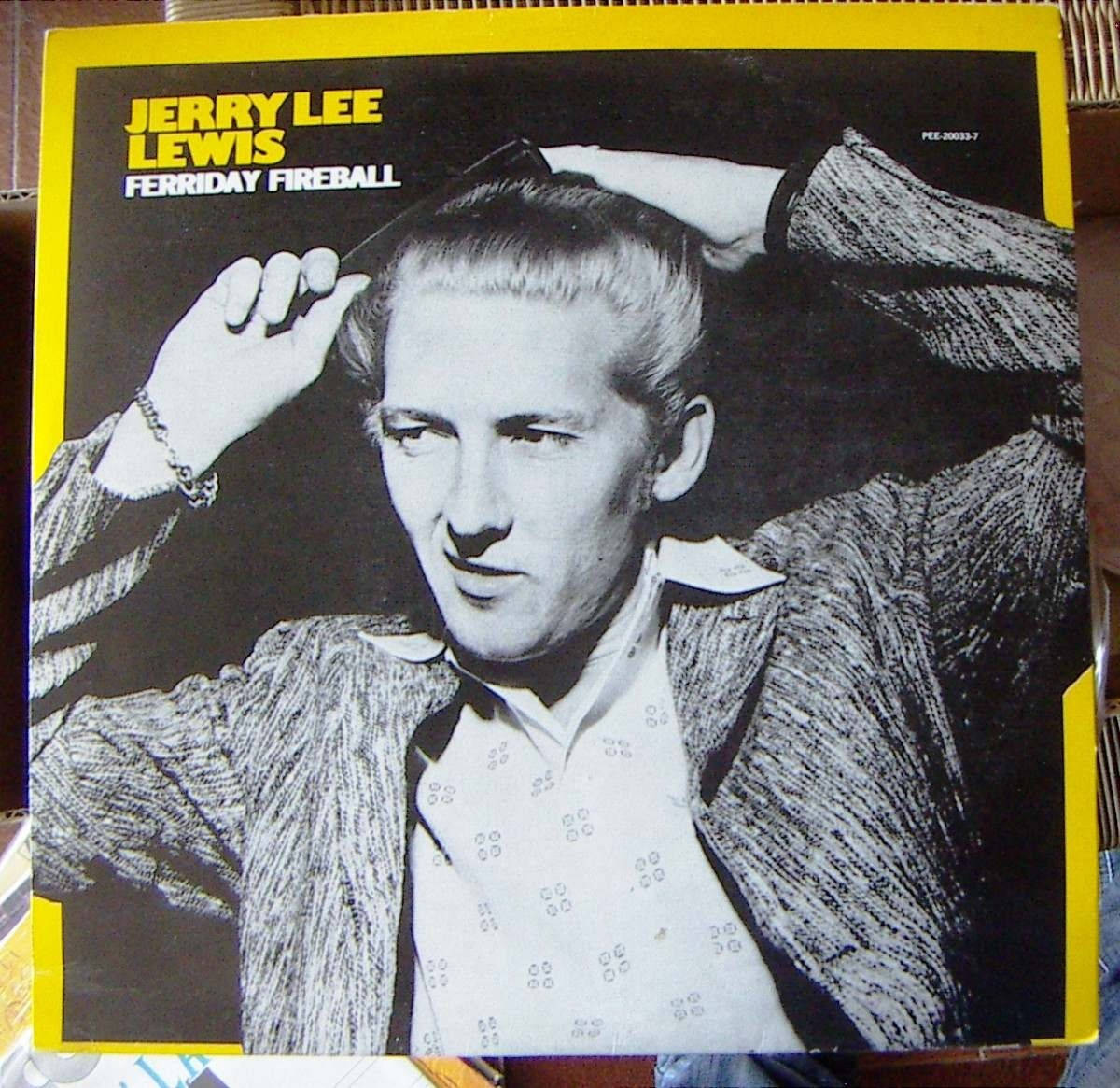 The Music Pioneer, Jerry Lee Lewis, Combing His Hair Background