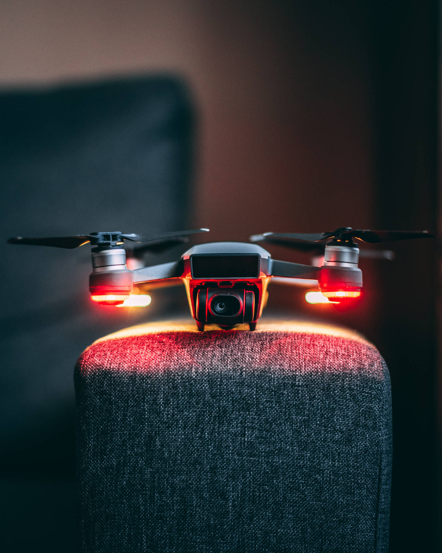 The New Age Of Technology: A Drone On An Armchair Background