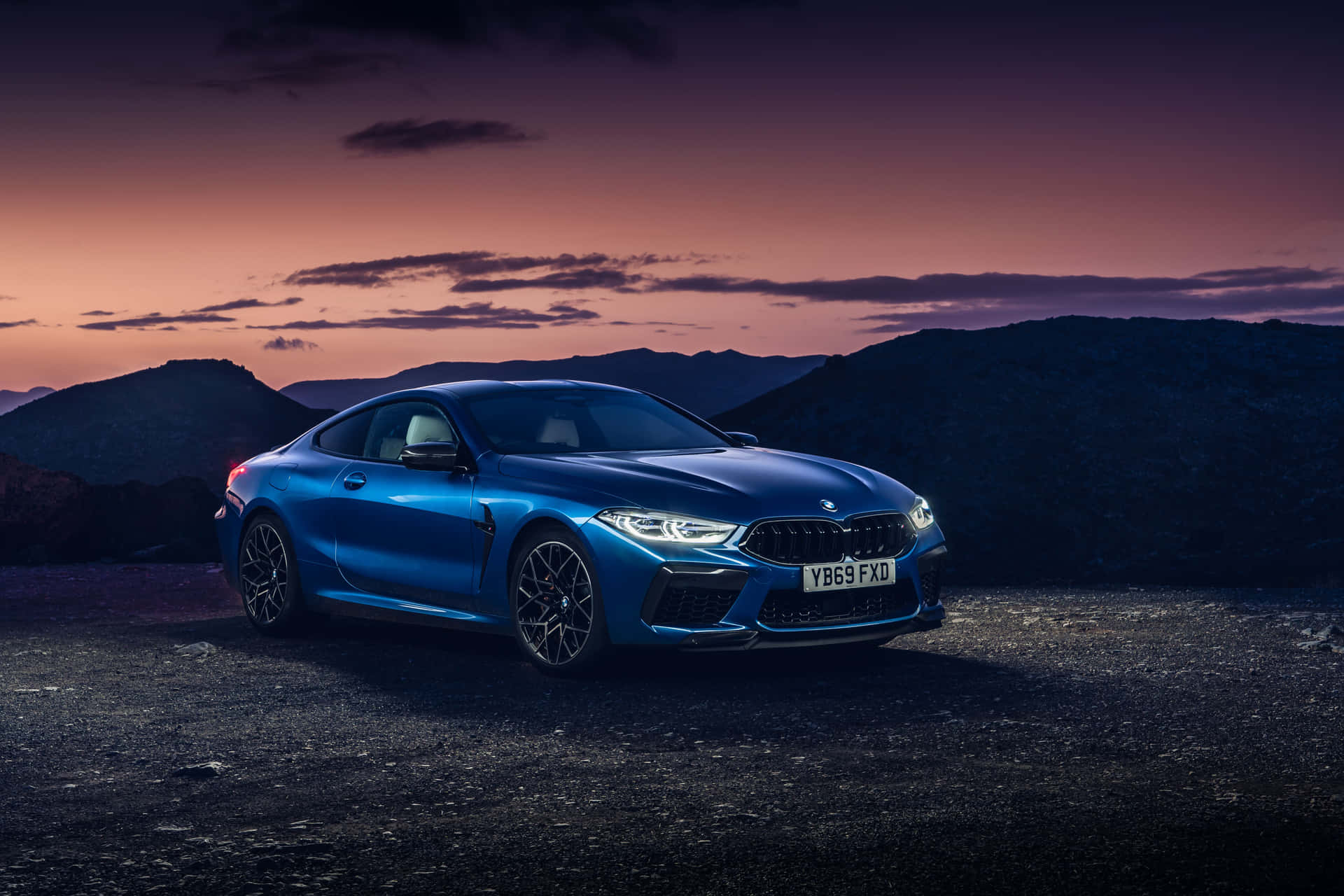 The New Bmw M8 Coupe Is Shown In The Evening Light Background