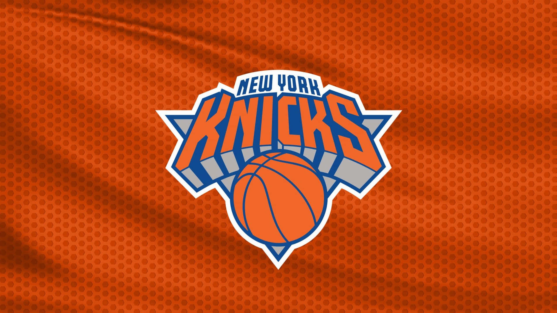 The New York Knicks Logo On An Orange Background