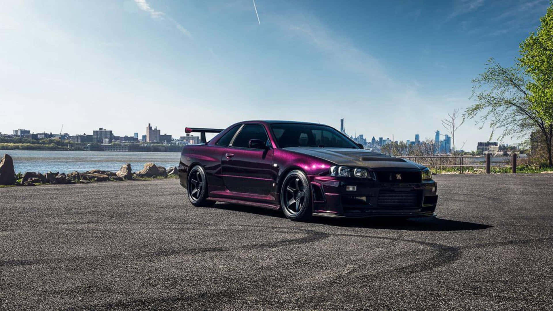 The Nissan Skyline R33 Gtr- A Powerful Racing Machine Background