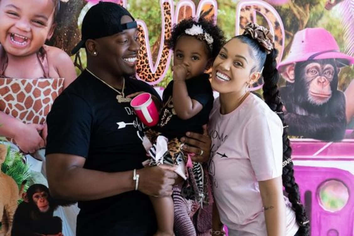 The Prince Family Celebrating Together At Home Background