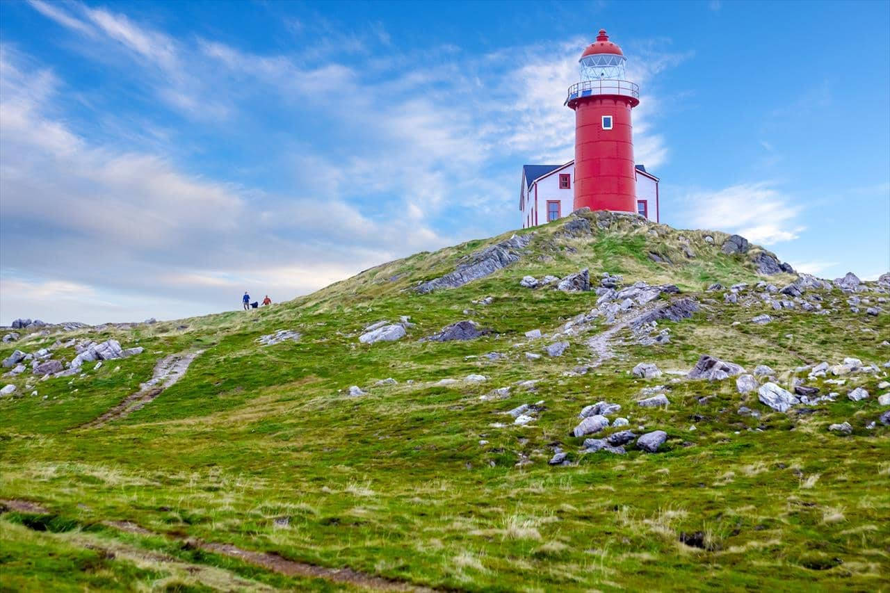 The Red Lighthouse In Newfoundland Background