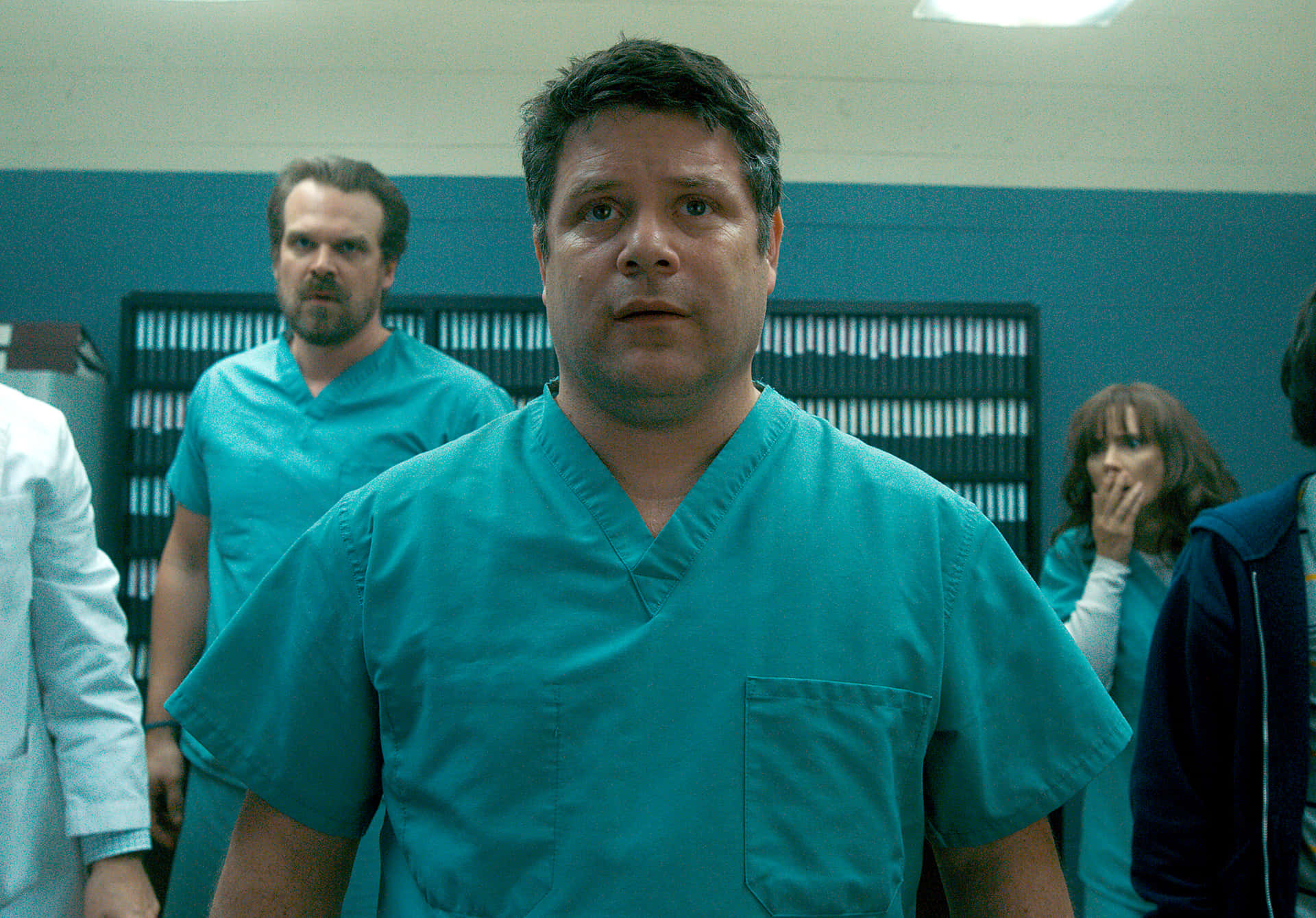 The Renowned Hollywood Actor, Sean Astin, Pointedly Looks Into The Distance, Exuding An Air Of Intrigue And Sophistication. Background