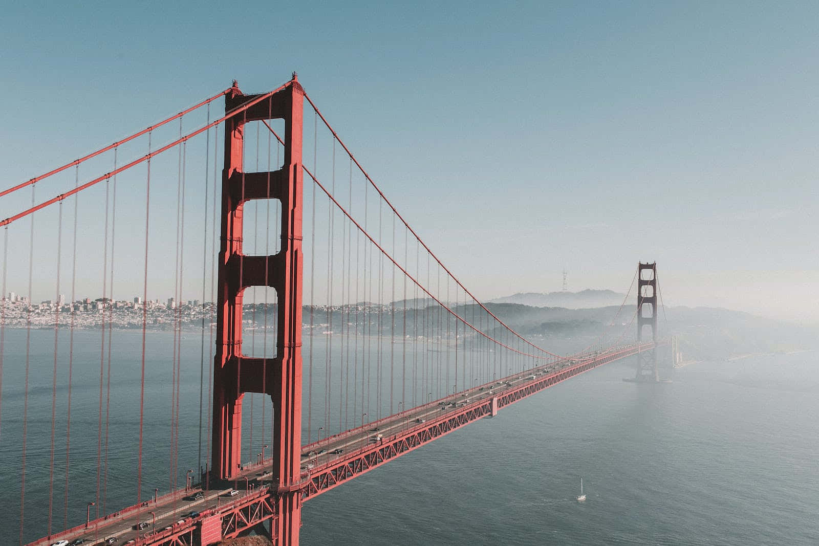 The San Francisco Skyline Shrouded In Fog Background