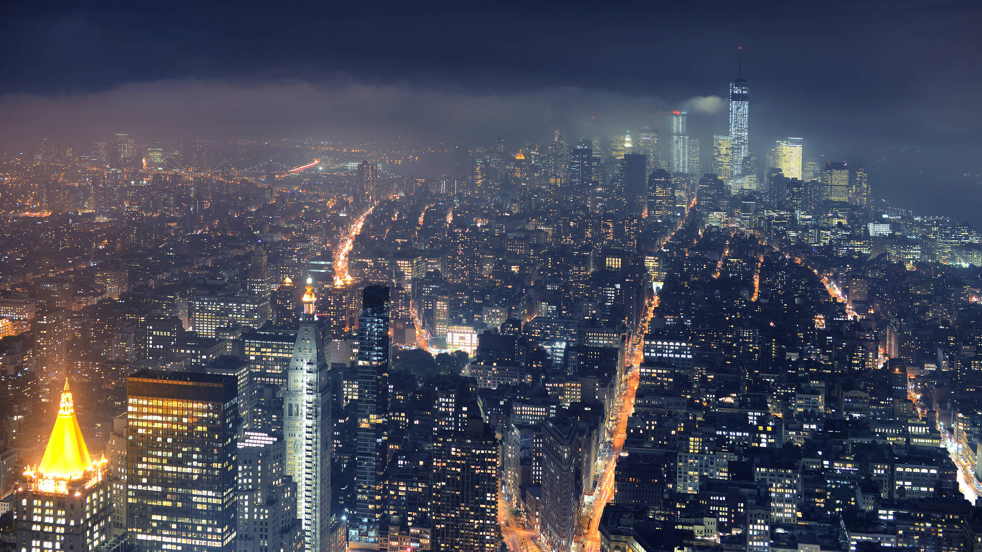 The Scintillating Charm Of The Big Apple At Night Background