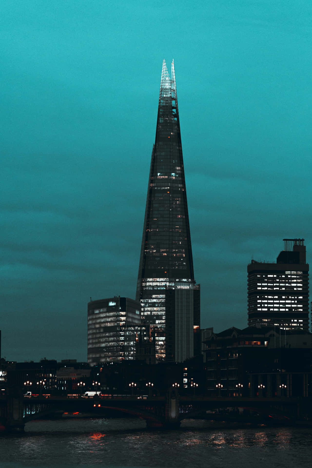 The Shard Underneath A Teal Sky Background